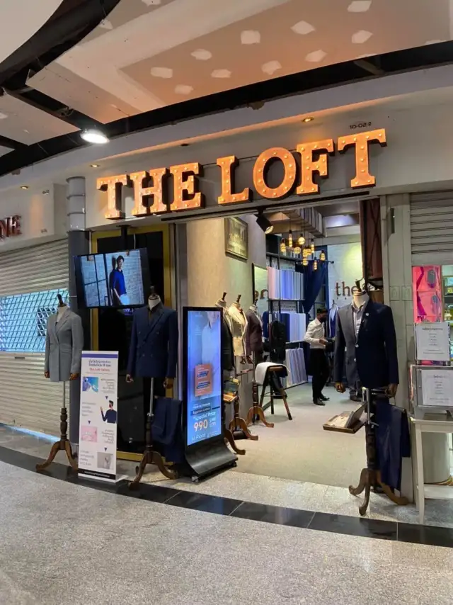 An earlier Loft shopfront, the lit sign above the entrance